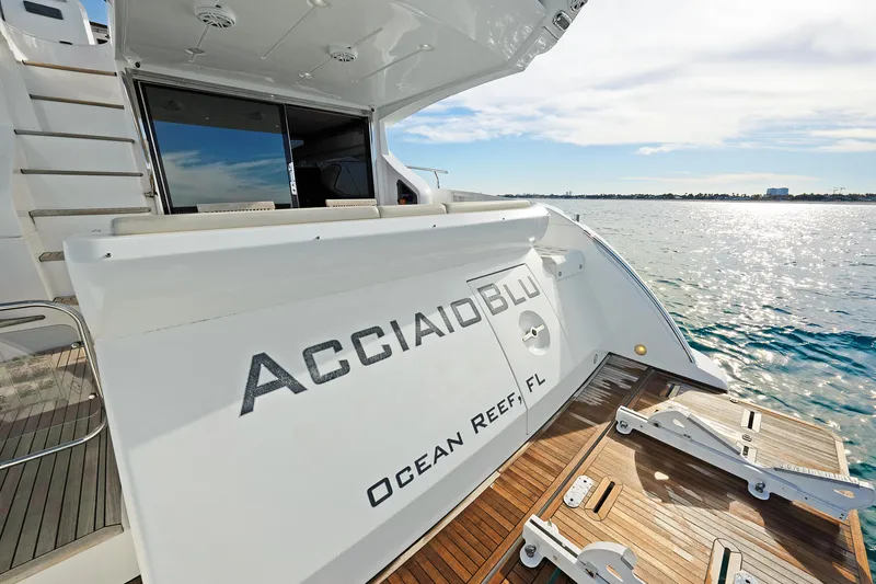 Slide: The Image of Azimut 60 Flybridge 2017 yacht, named "ACCAIAIO BLU," docked at Ocean Reef, FL. - 2