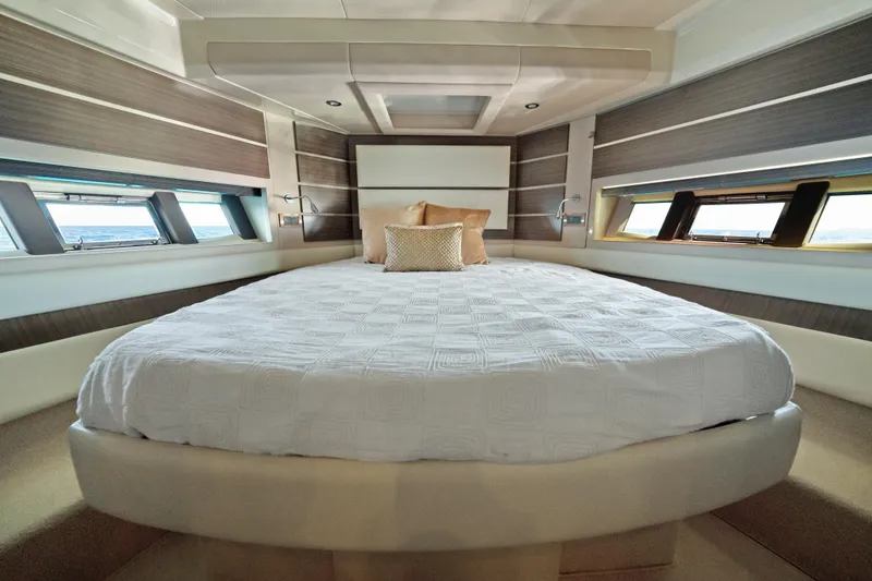 Slide: The Image of Luxurious bedroom interior of 2017 Azimut 60 Flybridge yacht with elegant bedding. - 27