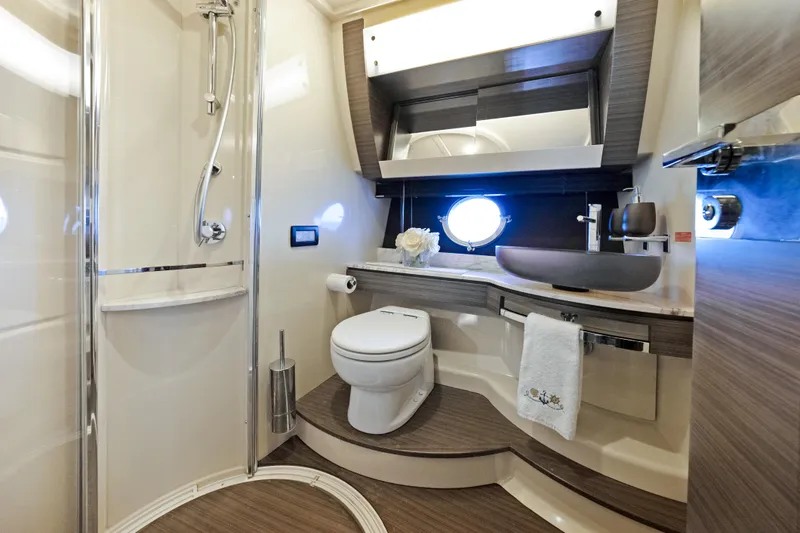 Slide: The Image of Luxurious bathroom in 2017 Azimut 60 Flybridge yacht with modern fixtures and elegant design. - 28