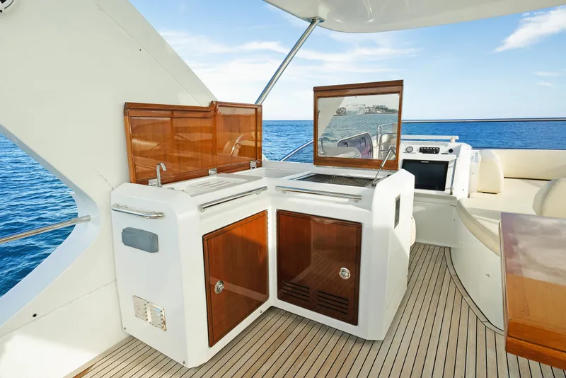 Slide: The Image of Luxurious 2017 Azimut 60 Flybridge yacht with elegant outdoor kitchen and ocean view. - 35