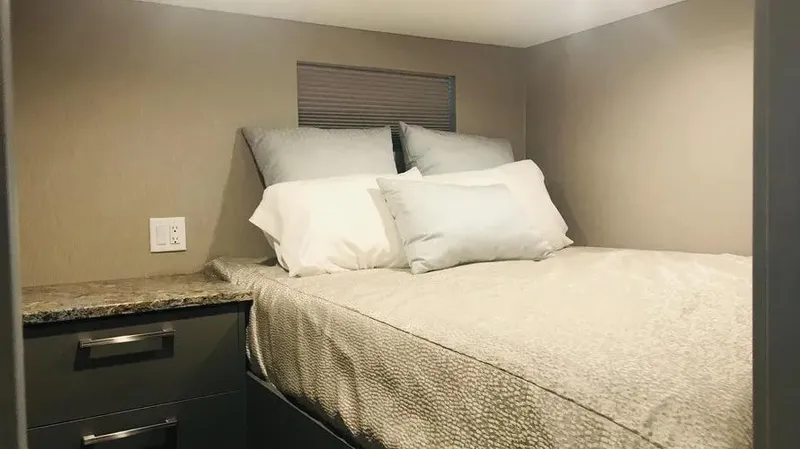 Slide: The Image of Cozy bedroom interior in 2019 Adonia Inspiration Trip #14 RV with plush bedding. - 13