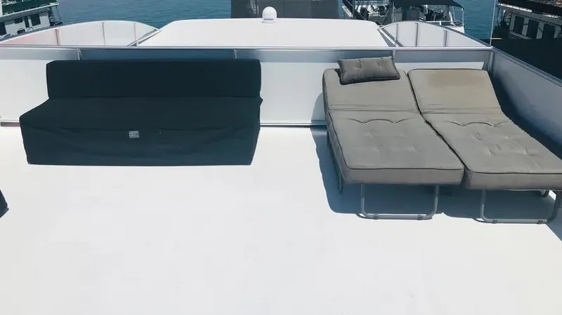 Slide: The Image of Rooftop deck with lounge chairs on Adonia Inspiration Trip #14, 2019. - 21