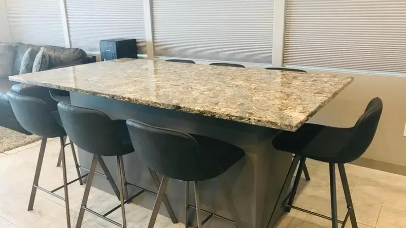 Slide: The Image of Granite kitchen island with black chairs in modern interior, Adonia Inspiration Trip #14, 2019. - 6