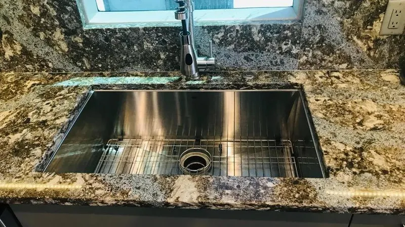 Slide: The Image of Granite countertop with stainless steel sink and modern faucet, Adonia Inspiration Trip #14, 2019. - 7