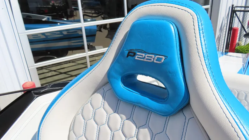 Slide: The Image of 2025 Wright Performance P280 seat with blue and white hexagonal design. - 12