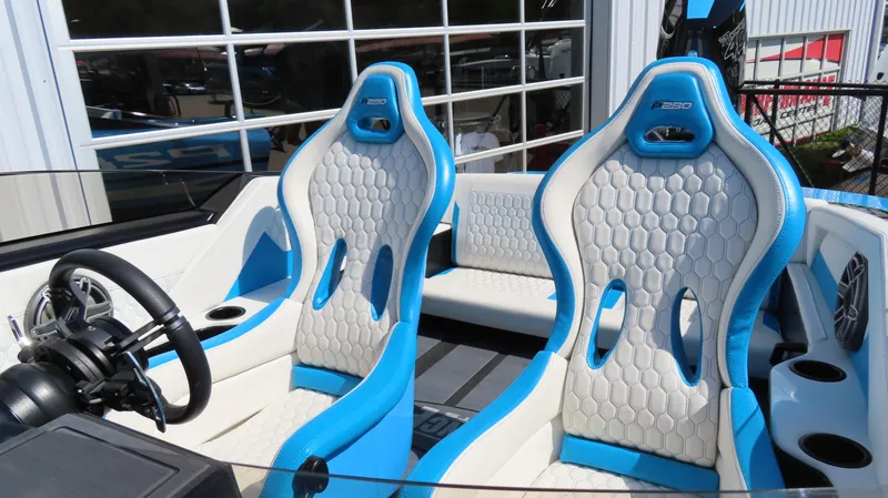 Slide: The Image of 2025 Wright Performance P280 boat interior with blue and white racing seats. - 18