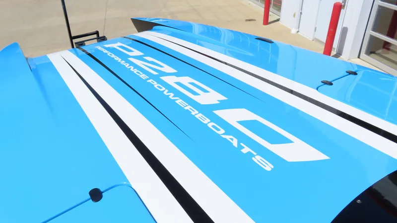 Slide: The Image of 2025 Wright Performance P280 powerboat with blue and white design, showcasing sleek lines. - 19
