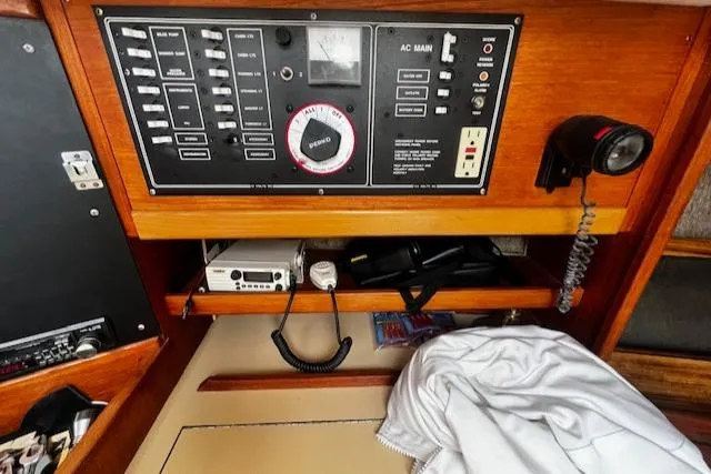 Slide: The Image of Control panel of a 1988 CAL Sloop sailboat with radio and equipment. - 12