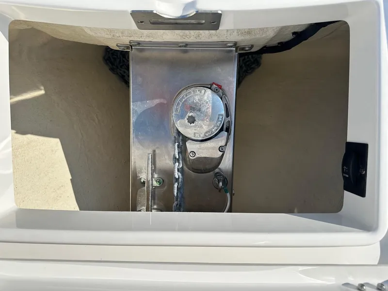 Slide: The Image of Anchor locker of a 2019 Regulator 28 boat with chain and winch. - 5