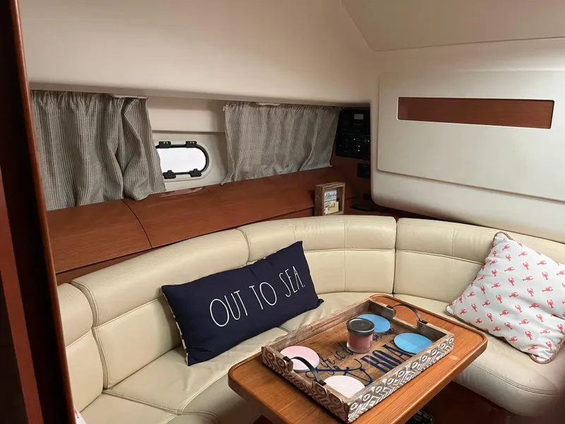 Slide: The Image of Interior of 2008 Jeanneau Prestige 34 Hardtop with cozy seating and nautical decor. - 20