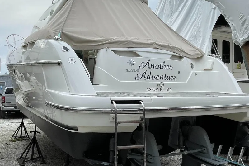 Slide: The Image of 2008 Jeanneau Prestige 34 Hardtop yacht named "Another Adventure" in dry dock. - 25