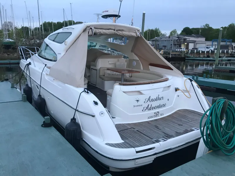 Slide: The Image of 2008 Jeanneau Prestige 34 Hardtop yacht docked at marina. - 6