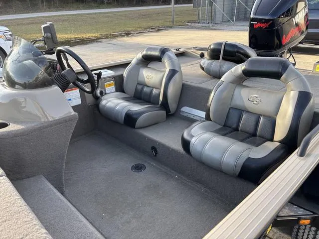 Slide: The Image of Interior of a 2011 G3 Eagle 190 boat with two cushioned seats. - 8