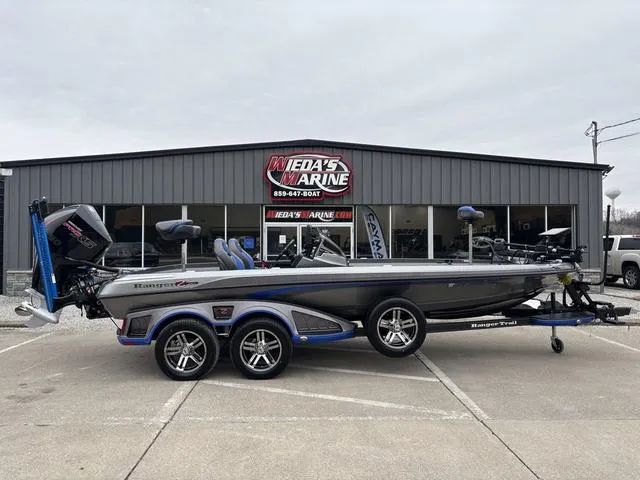 Slide: The Image of 2023 Ranger Z521R boat parked outside Wieda's Marine dealership. - 1