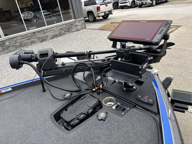 Slide: The Image of 2023 Ranger Z521R boat dashboard with advanced navigation and control systems. - 11