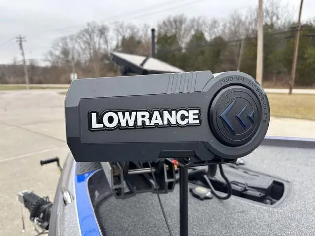Slide: The Image of Lowrance device on 2023 Ranger Z521R boat, outdoor setting. - 12