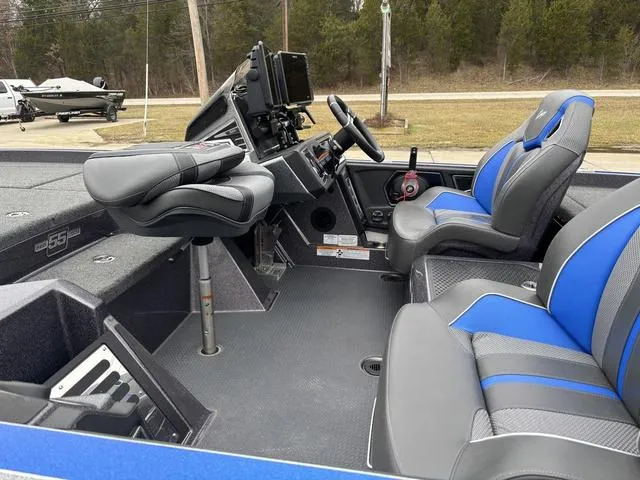 Slide: The Image of 2023 Ranger Z521R boat interior with modern seating and advanced dashboard controls. - 15