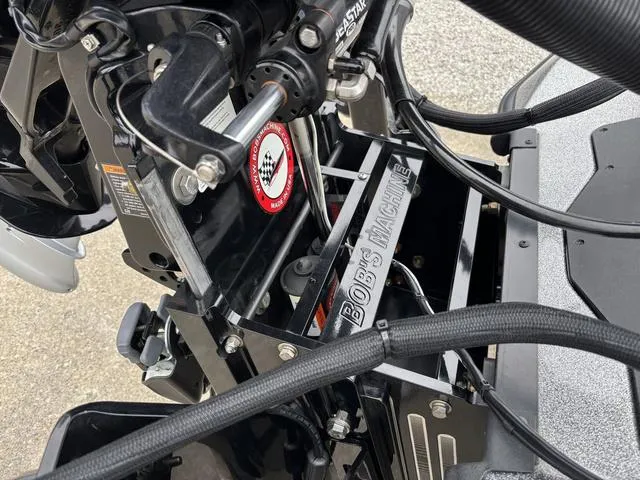 Slide: The Image of 2023 Ranger Z521R boat engine components with visible wiring and mechanical parts. - 3