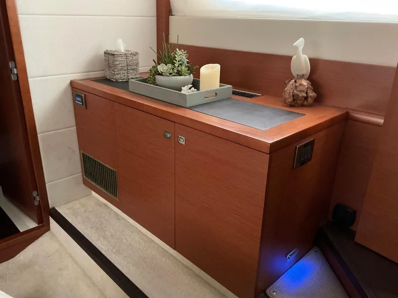 Slide: The Image of Luxurious interior of a 2015 Prestige 500 yacht with elegant wooden cabinetry. - 37