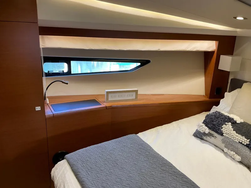 Slide: The Image of Luxurious cabin interior of a 2015 Prestige 500 yacht with modern design elements. - 40