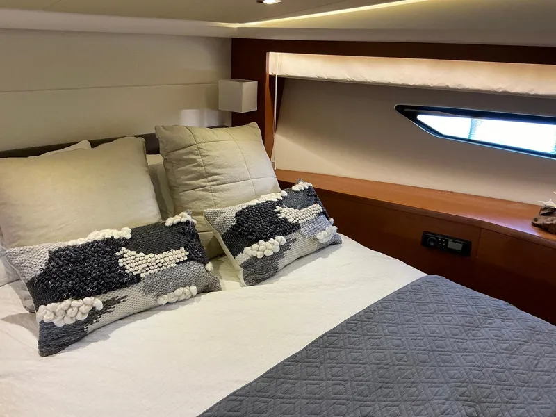 Slide: The Image of Luxurious bedroom interior of 2015 Prestige 500 yacht with stylish bedding and modern design. - 41