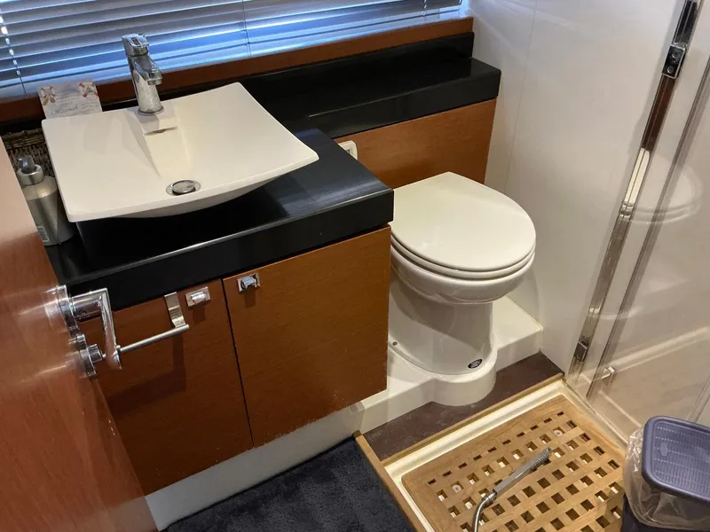 Slide: The Image of Modern bathroom in 2015 Prestige 500 yacht with sink, toilet, and shower. - 45