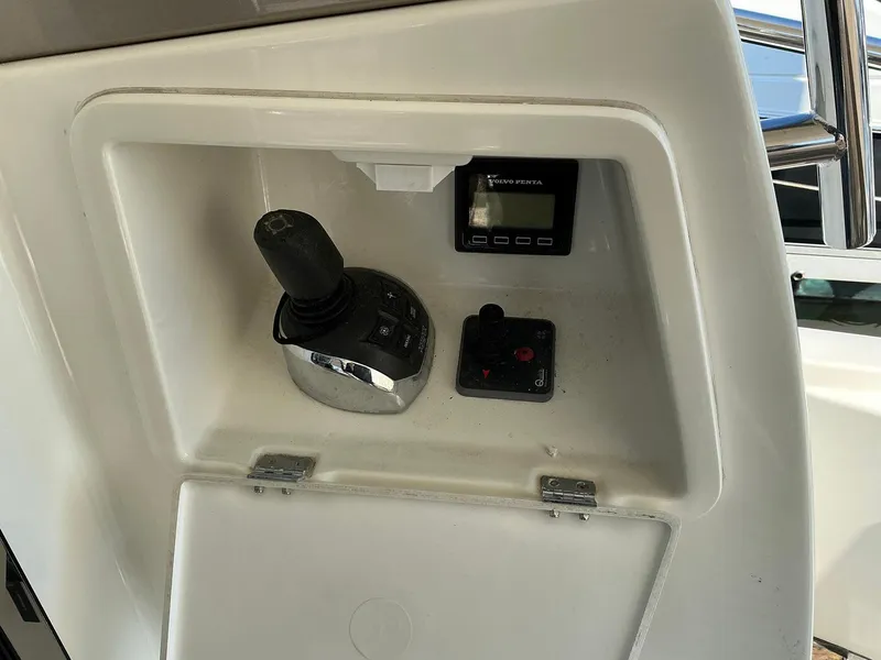 Slide: The Image of Control panel of a 2015 Prestige 500 yacht with joystick and display. - 46