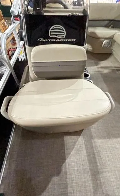 Slide: The Image of 2022 Sun Tracker BB16 boat seat with beige upholstery and modern design. - 7