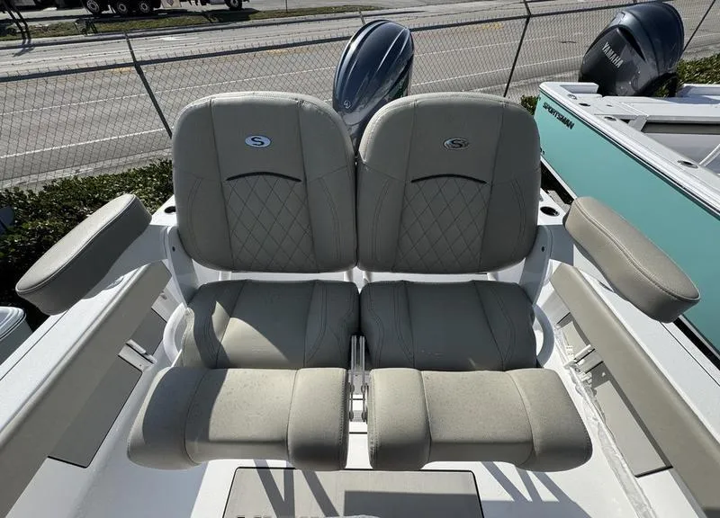 Slide: The Image of 2025 Sportsman Masters 227 boat seats with quilted design and armrests. - 15