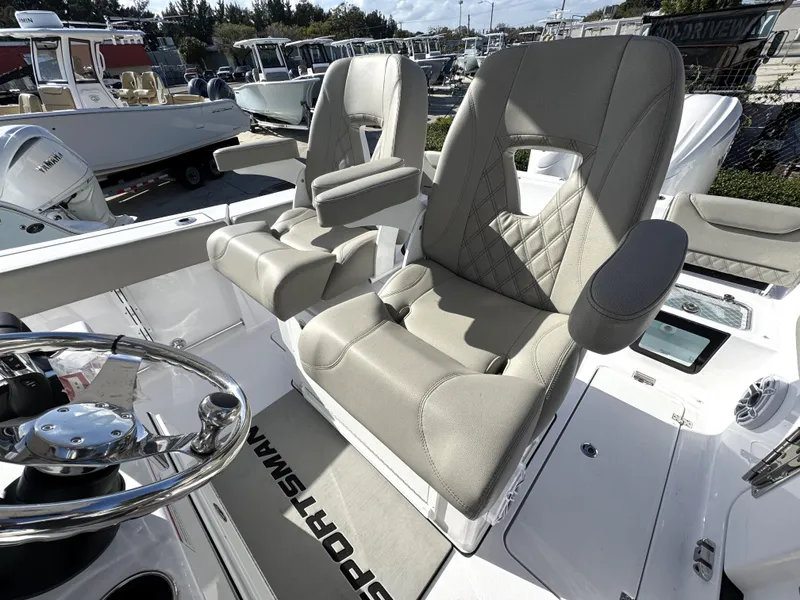 Slide: The Image of 2025 Sportsman Heritage 261 boat seats, featuring luxurious beige upholstery and modern design. - 15