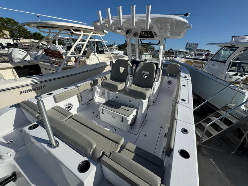 Slide: The Image of 2025 Sportsman Heritage 261 boat with spacious seating and modern design. - 31