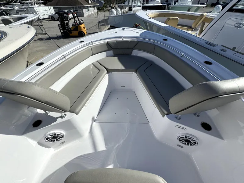 Slide: The Image of 2025 Sportsman Heritage 261 boat with spacious seating and modern design. - 8