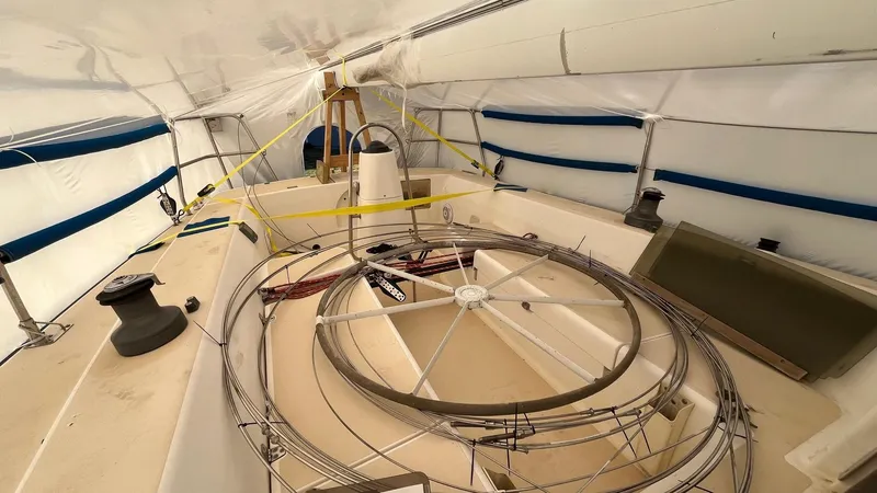 Slide: The Image of Interior view of a 2000 J Boats J/105 sailboat under cover. - 12