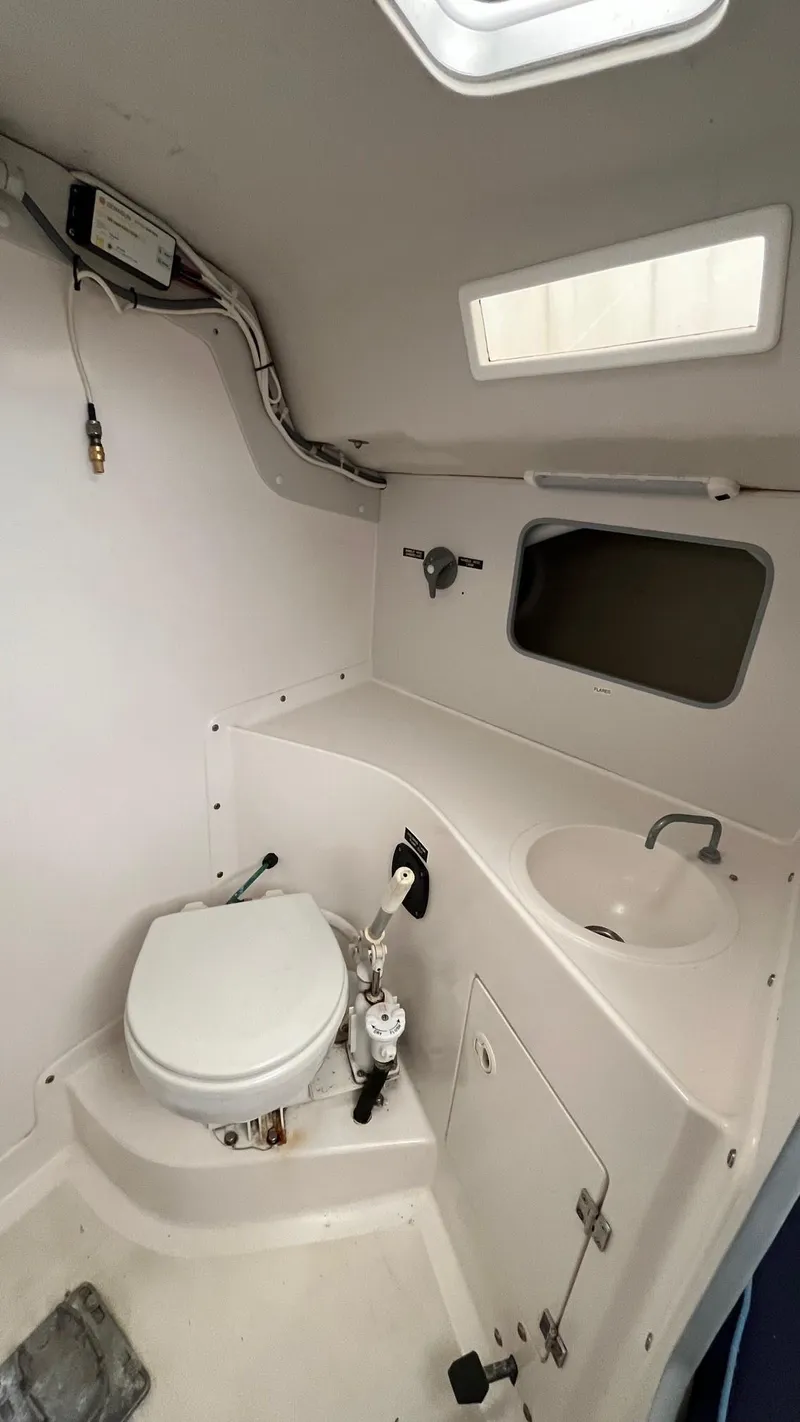 Slide: The Image of 2000 J Boats J/105 interior bathroom with toilet and sink. - 18