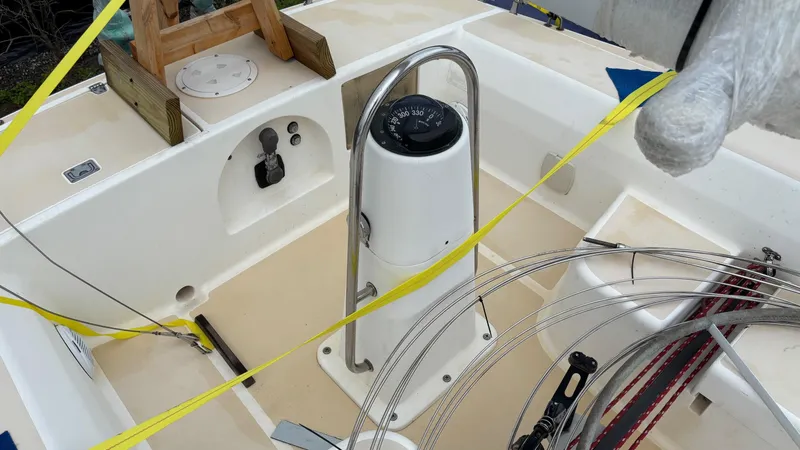 Slide: The Image of Cockpit of a 2000 J Boats J/105 sailboat with steering pedestal and rigging. - 25