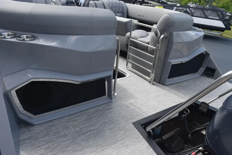 Slide: The Image of 2023 Bennington 25 RTFB boat interior with gray seating and modern design. - 5