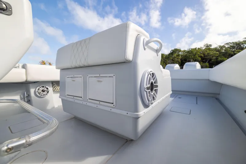 Slide: The Image of 2006 Contender 33 Tournament boat interior with seating and storage compartments. - 39