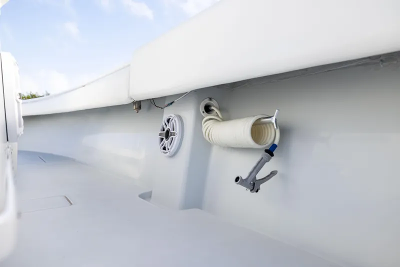 Slide: The Image of 2006 Contender 33 Tournament boat interior with hose and speaker detail. - 47