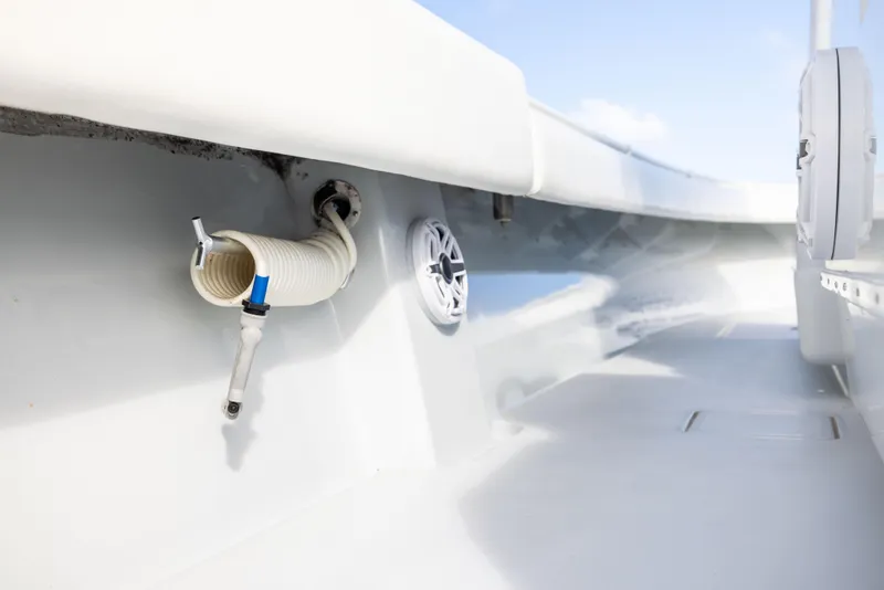 Slide: The Image of 2006 Contender 33 Tournament boat deck with hose and speaker. - 48