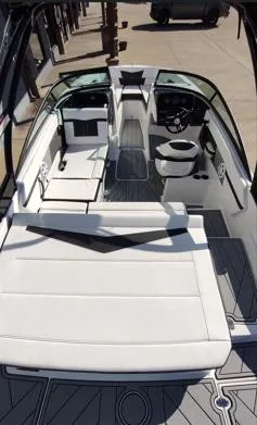 Slide: The Image of 2025 Monterey M-225 boat interior with sleek seating and modern design. - 12