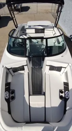 Slide: The Image of 2025 Monterey M-225 boat interior with seating and speakers, viewed from above. - 3