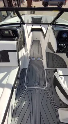 Slide: The Image of 2025 Monterey M-225 boat interior with sleek, modern design and comfortable seating. - 4