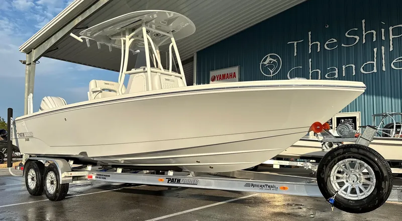 The Image of 2025 Pathfinder 2400 Open boat on trailer at dealership. - 0
