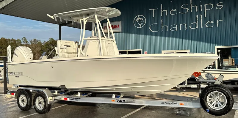 Slide: The Image of 2025 Pathfinder 2400 Open boat on trailer at The Ships Chandler dealership. - 1