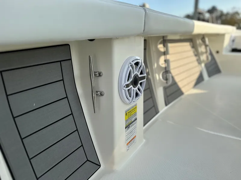 Slide: The Image of 2025 Pathfinder 2400 Open boat interior with speaker and sleek design elements. - 12