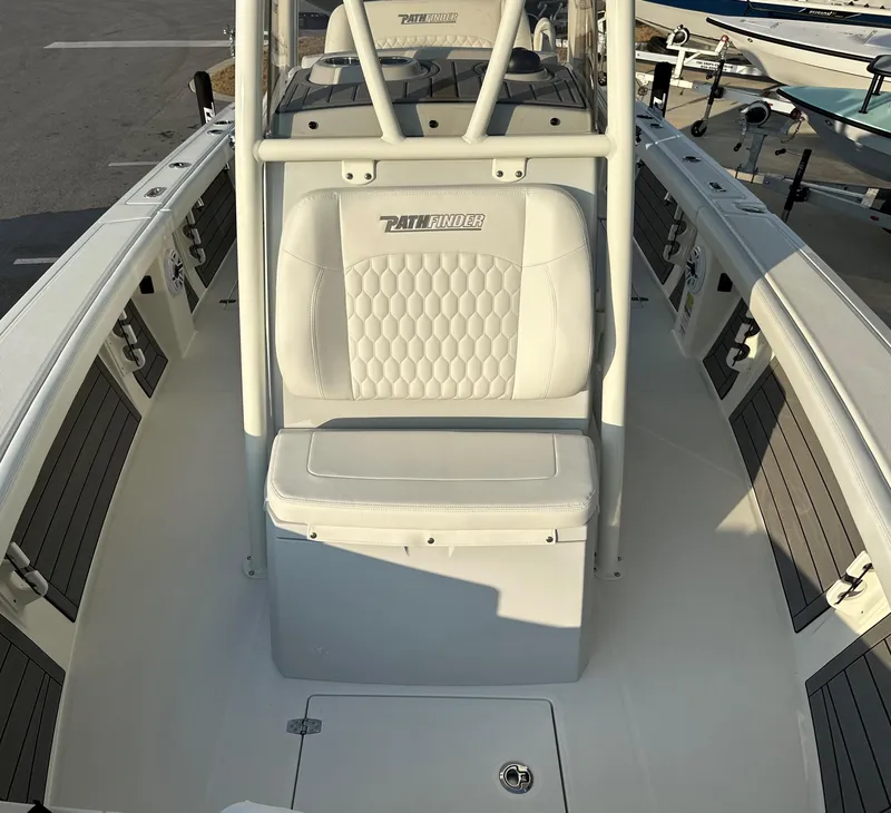 Slide: The Image of 2025 Pathfinder 2400 Open boat interior with white seating and sleek design. - 15