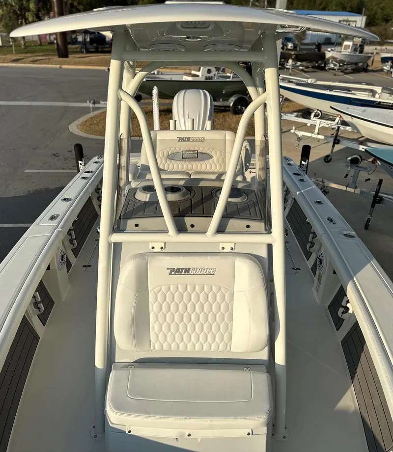 Slide: The Image of 2025 Pathfinder 2400 Open boat interior with seating and console, showcasing modern design. - 16