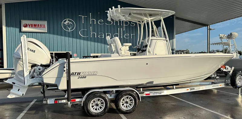 Slide: The Image of 2025 Pathfinder 2400 Open boat on trailer at dealership. - 3