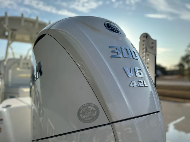 Slide: The Image of 2025 Pathfinder 2400 Open boat with Yamaha 300 V6 4.2L engine, close-up view. - 9