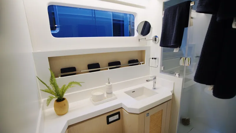 Slide: The Image of Luxurious yacht interior with modern kitchen and ocean view, Two Oceans 555 - 008, 2025 model. - 11